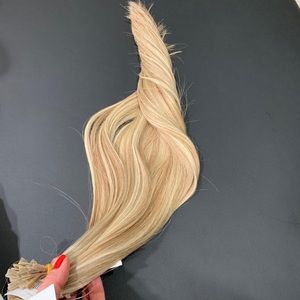 150  strands of smooth hair prepared . 20 inch